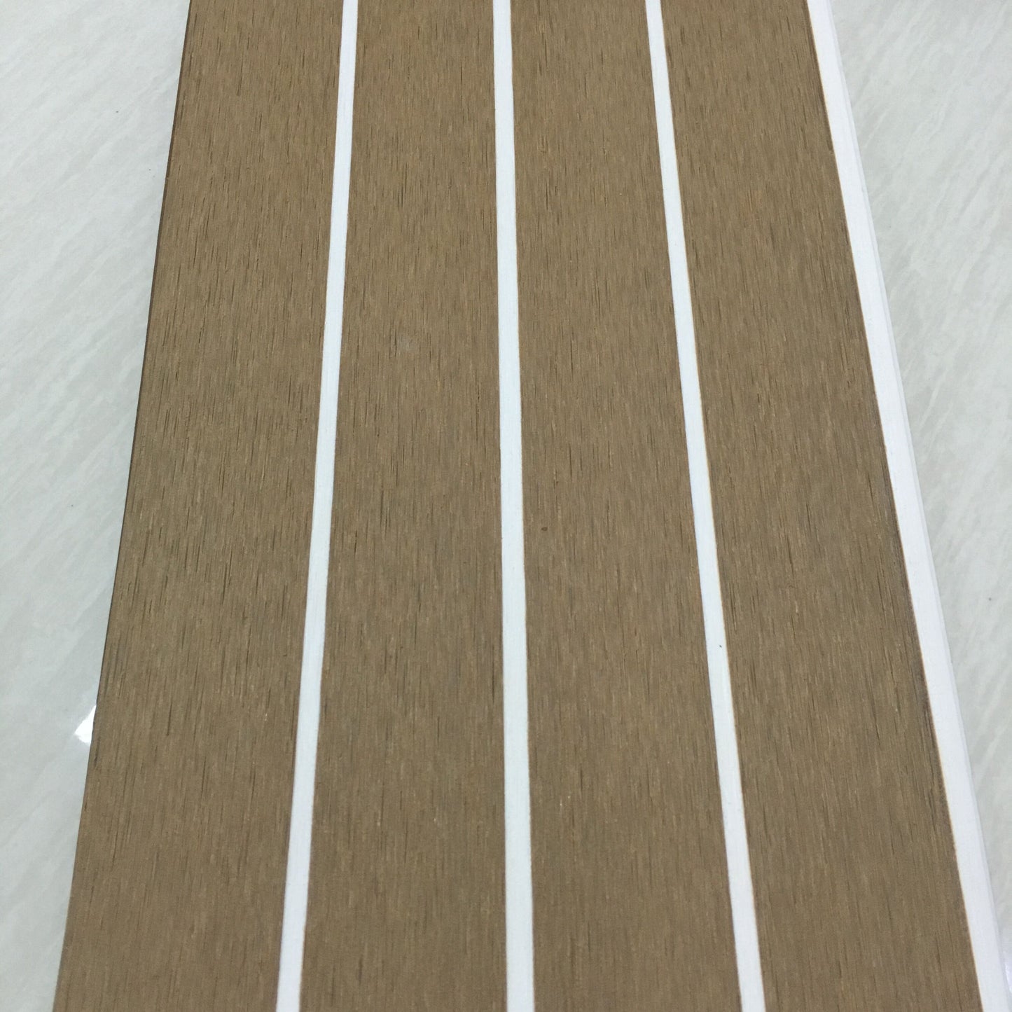 Teak with White Caulking Marine Decking